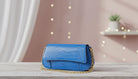 Blue Crocodile-Textured Handbag with Gold Chain - Charming Charlie