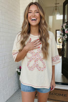 Floral Looped Cream Graphic Tee - Charming Charlie