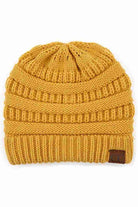 HoneyMustard C.C Ribbed Knit Solid Color Beanie offers a timeless design with durable ribbed knitting, ensuring a snug and comfortable fit. Crafted for warmth and versatility, this beanie is perfect for everyday wear, providing reliable protection against cold weather while maintaining a sleek, minimalist style that complements any outfit. Its solid color adds understated appeal, making it an essential accessory for both casual and outdoor use.  