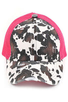 Hot  Pink C.C cow print criss cross ponycap is the perfect blend of style and functionality. The adjustable criss cross design allows for a comfortable and secure fit, while the unique cow print pattern adds a touch of fun to any outfit. Made with high-quality materials, this ponycap is durable and long-lasting.