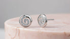GL Creations- Sterling Silver CZ Swirl Round Studs - Charming Charlie