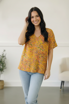 Sunlit Meadow Floral Top - Charming Charlie