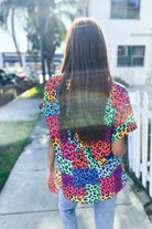 Dazzle in Multicolor Animal Patchwork V Neck Dolman Cap Sleeve Top - Charming Charlie