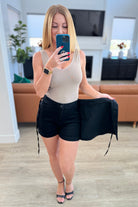 Bentli High Rise Side Tie Denim Skort in Black - Charming Charlie