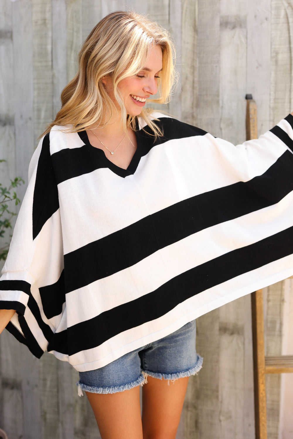The Traveler Black/White Stripe Dolman Notch Neck Sweater Poncho - Charming Charlie