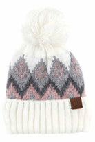 Ivory C C Soft Aztec Pattern Beanie with Knit Pom, is beautifully knitted with variety of colors and design that brings a unique look. Coordinate with any outfit to match the best with absolute warmth and coziness in style. This is an ideal winter head cover that comes in one size winter cap with a pom that fits most head sizes. Perfect winter gift accessory for your friends, family and the persons you love.