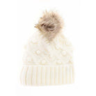 Ivory KIDS Bobble Knit Faux Fur Pom C.C Beanie combines warmth and style, offering cozy comfort with its soft knit fabric and a plush faux fur pom-pom. Designed specifically for children, it provides a secure, comfortable fit to keep little heads warm during colder months while adding a playful, fashionable touch. Durable and easy to wear, this beanie is ideal for everyday winter activities. 