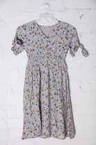 Kids Adorable Blue Smocked Waist Floral Bow Tie Sleeve Dress - Charming Charlie