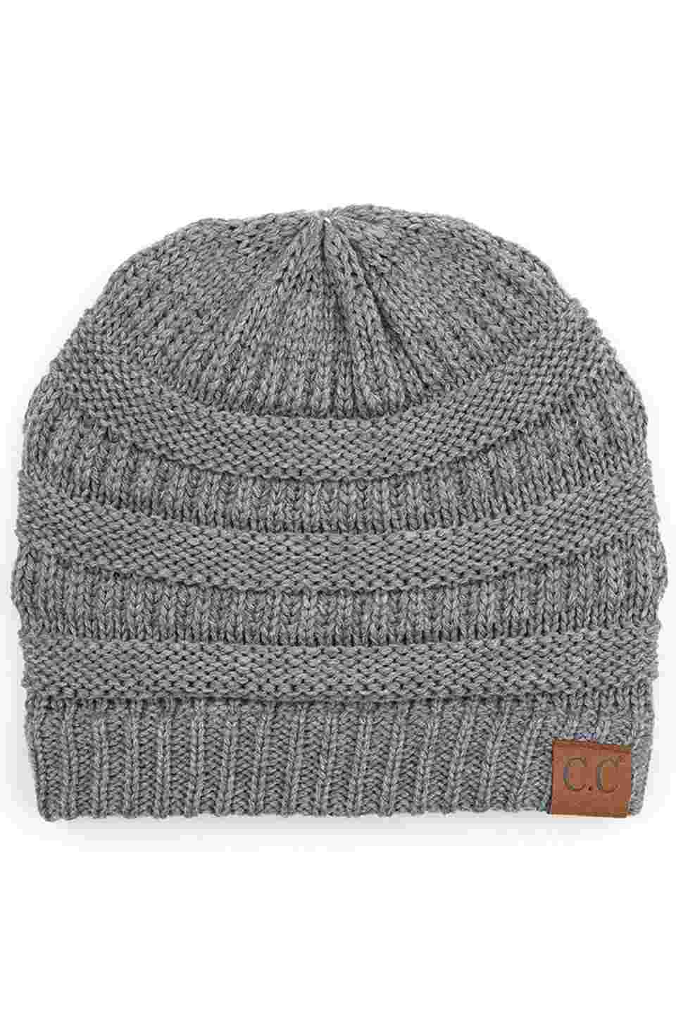 LightMelangeGrey  C.C Ribbed Knit Solid Color Beanie offers a timeless design with durable ribbed knitting, ensuring a snug and comfortable fit. Crafted for warmth and versatility, this beanie is perfect for everyday wear, providing reliable protection against cold weather while maintaining a sleek, minimalist style that complements any outfit. Its solid color adds understated appeal, making it an essential accessory for both casual and outdoor use. 
