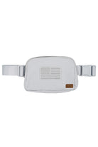 Light Gray C.C American Flag Embroidery Patch Fanny Pack is a stylish and practical accessory for everyday use. Crafted with an embroidered American flag patch, this fanny pack is both patriotic and fashionable. With its spacious compartments and adjustable waist strap, it offers convenience and hands-free functionality. Perfect for carrying essentials while showing off your American pride.