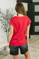 Little Details Trim Detail Top in Ruby - Charming Charlie