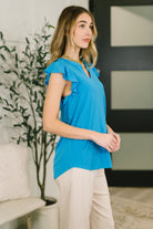 Lizzy Flutter Sleeve V-Neck Blouse in  in Aqua - Charming Charlie