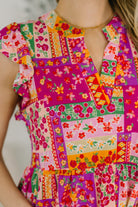 Lizzy Flutter Sleeve Dress in Patchwork Floral - Charming Charlie