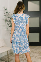 Lizzy Flutter Sleeve Dress in White and Blue Floral - Charming Charlie