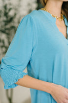 Lizzy Smock Top in Coastal Blue - Charming Charlie