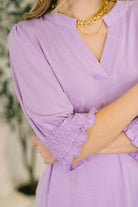 Lizzy Smock Top in Orchid Bloom - Charming Charlie