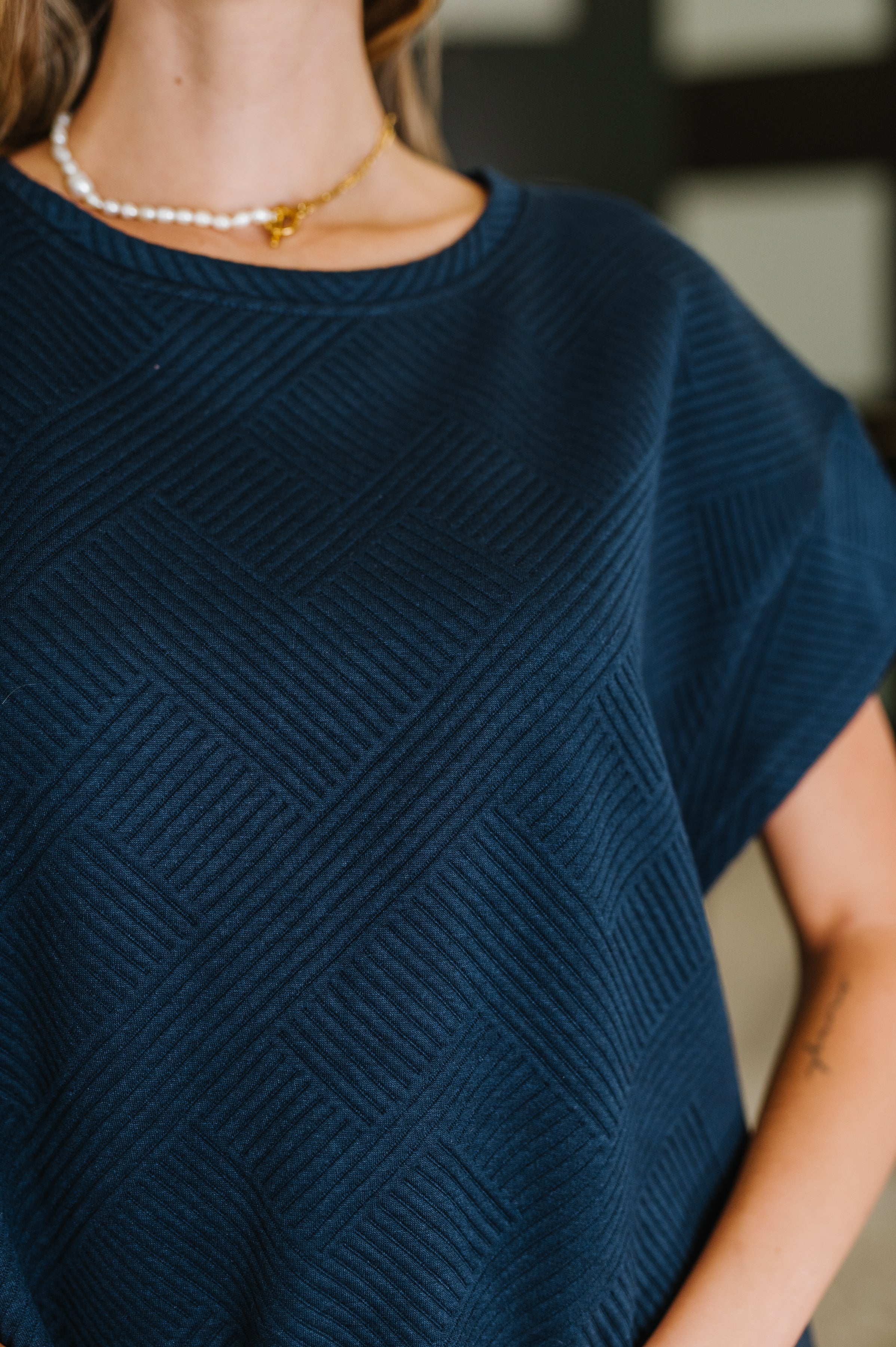 Love on the Loose Quilted Top in Navy - Charming Charlie