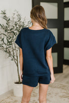 Love on the Loose Quilted Top in Navy - Charming Charlie