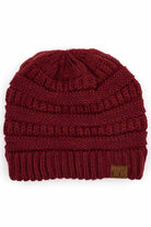 Maroon  C.C Ribbed Knit Solid Color Beanie offers a timeless design with durable ribbed knitting, ensuring a snug and comfortable fit. Crafted for warmth and versatility, this beanie is perfect for everyday wear, providing reliable protection against cold weather while maintaining a sleek, minimalist style that complements any outfit. Its solid color adds understated appeal, making it an essential accessory for both casual and outdoor use. 