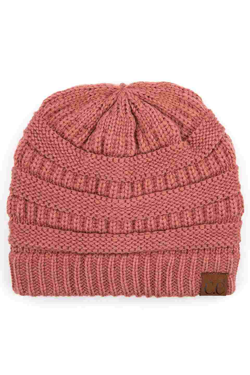 Mauve  C.C Ribbed Knit Solid Color Beanie offers a timeless design with durable ribbed knitting, ensuring a snug and comfortable fit. Crafted for warmth and versatility, this beanie is perfect for everyday wear, providing reliable protection against cold weather while maintaining a sleek, minimalist style that complements any outfit. Its solid color adds understated appeal, making it an essential accessory for both casual and outdoor use. 