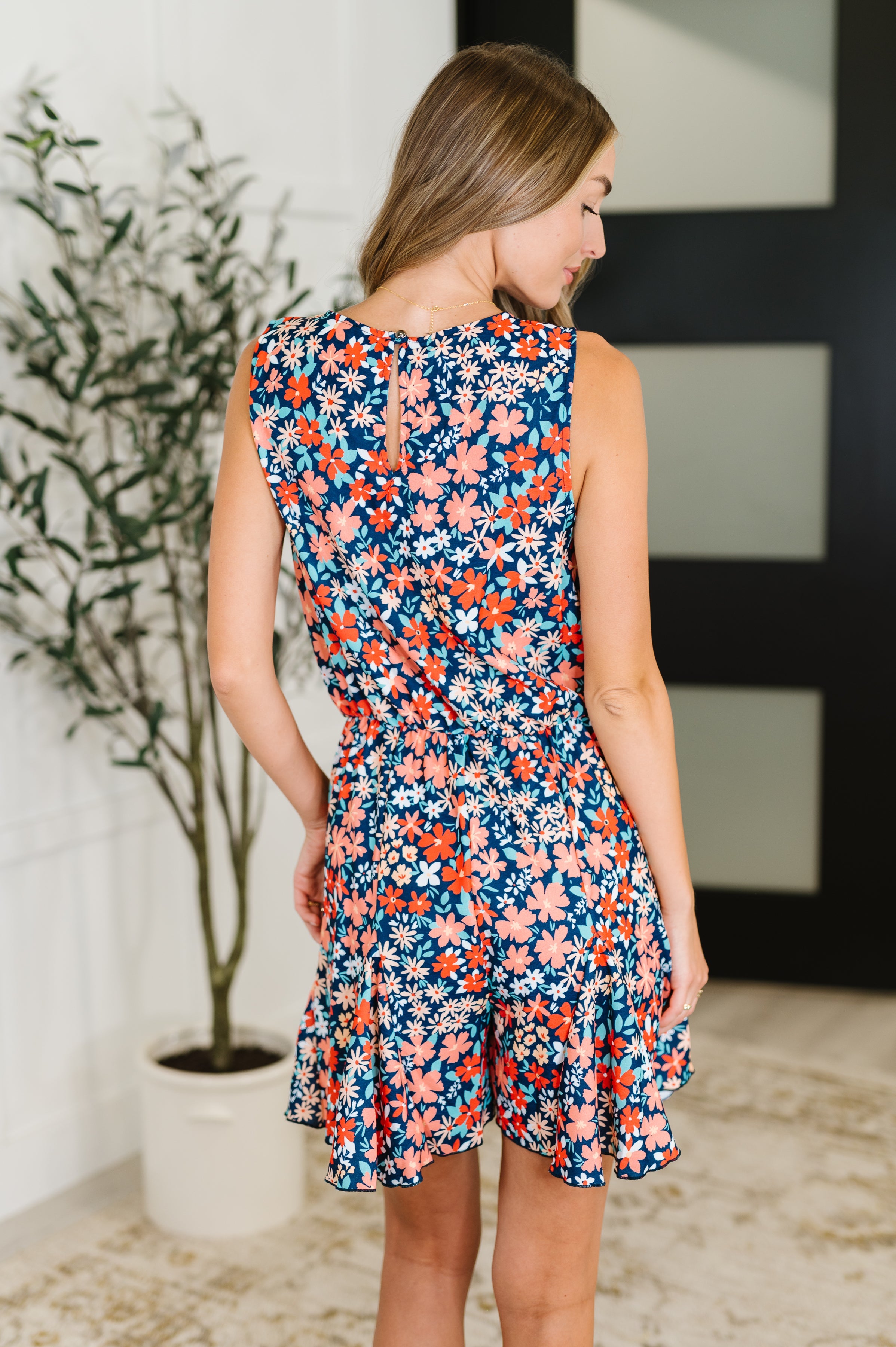 Meadow Mischief Sleeveless Romper in Navy/Orange/Teal - Charming Charlie