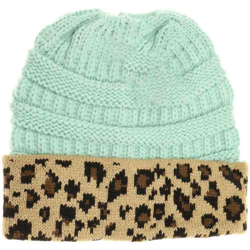 Mint Leopard Print CC Beanie Tail combines stylish leopard patterning with practical design, featuring a convenient tail opening perfect for ponytails or buns. Crafted from soft, breathable fabric, this beanie ensures comfortable wear during colder days while keeping your hair effortlessly in place. Ideal for outdoor activities or casual outings, it offers a blend of fashion and function that enhances your winter wardrobe. 