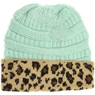 Mint Leopard Print CC Beanie Tail combines stylish leopard patterning with practical design, featuring a convenient tail opening perfect for ponytails or buns. Crafted from soft, breathable fabric, this beanie ensures comfortable wear during colder days while keeping your hair effortlessly in place. Ideal for outdoor activities or casual outings, it offers a blend of fashion and function that enhances your winter wardrobe. 