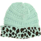 Mint Matching Cuff Leopard Print CC Beanie combines expert craftsmanship with standout style. Designed with a comfortable cuff and eye-catching leopard pattern, this beanie offers reliable warmth and a fashionable look. Its stretchy fabric ensures a secure fit for extended wear, making it an ideal accessory for cool weather while enhancing your seasonal wardrobe with a touch of wild sophistication. 