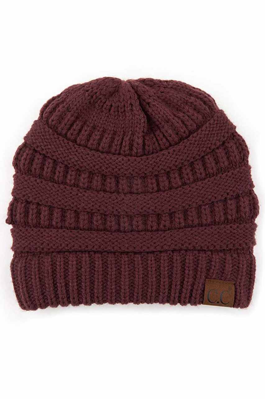 Monaco  C.C Ribbed Knit Solid Color Beanie offers a timeless design with durable ribbed knitting, ensuring a snug and comfortable fit. Crafted for warmth and versatility, this beanie is perfect for everyday wear, providing reliable protection against cold weather while maintaining a sleek, minimalist style that complements any outfit. Its solid color adds understated appeal, making it an essential accessory for both casual and outdoor use. 
