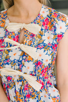 Mrs. Dependable Bow Detail Peplum Top - Charming Charlie