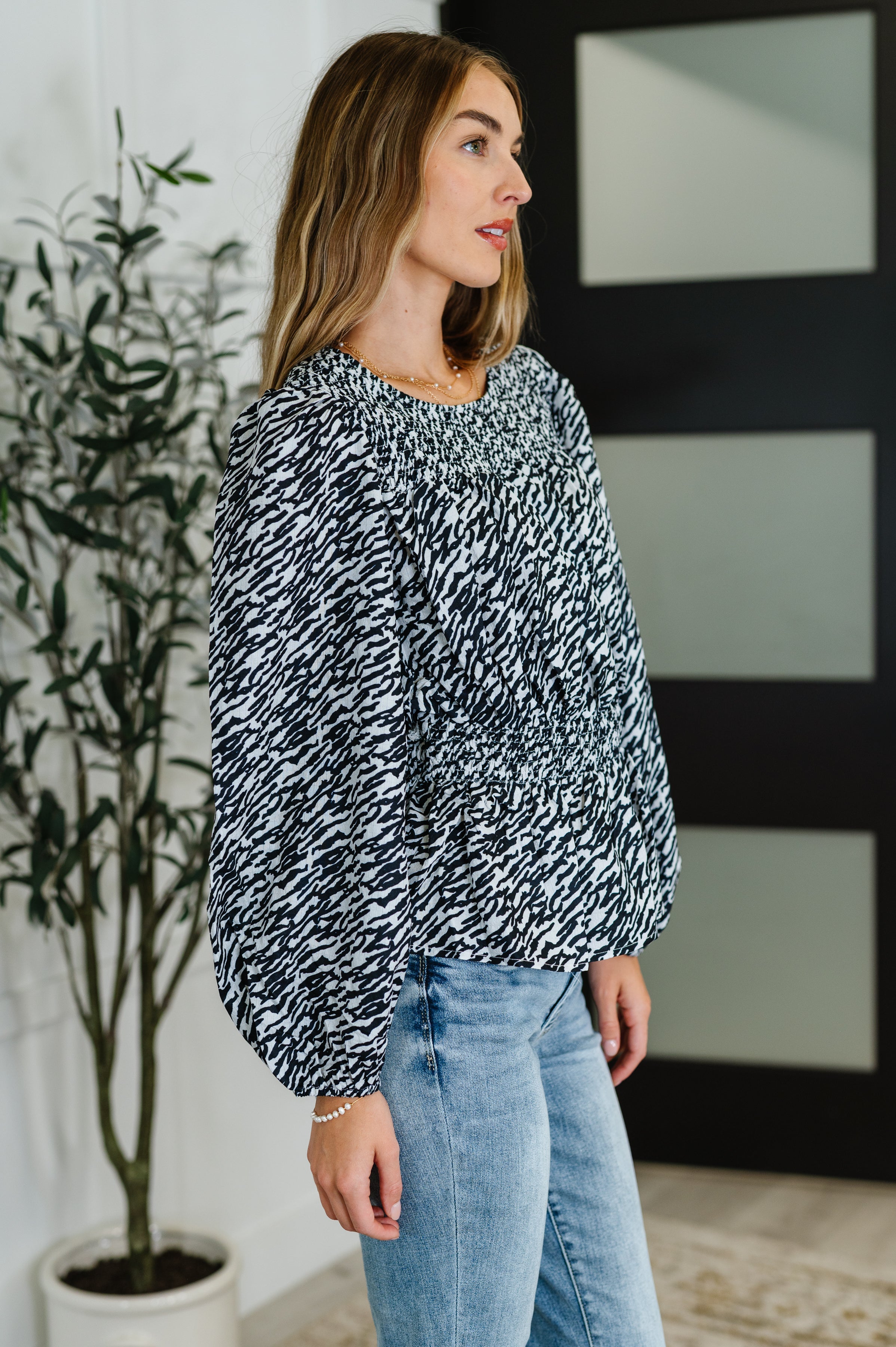 Muse Moves High Neck Peplum Blouse in Black - Charming Charlie