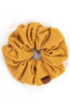 Mustard C.C Corduroy Solid Color Soft Scrunchies are a must-have for any hair accessory collection. Made from soft and durable corduroy material, these scrunchies are perfect for any hair type and can hold hair in place comfortably without causing any damage. Add some style to your hairstyle with these versatile and fashionable scrunchies.