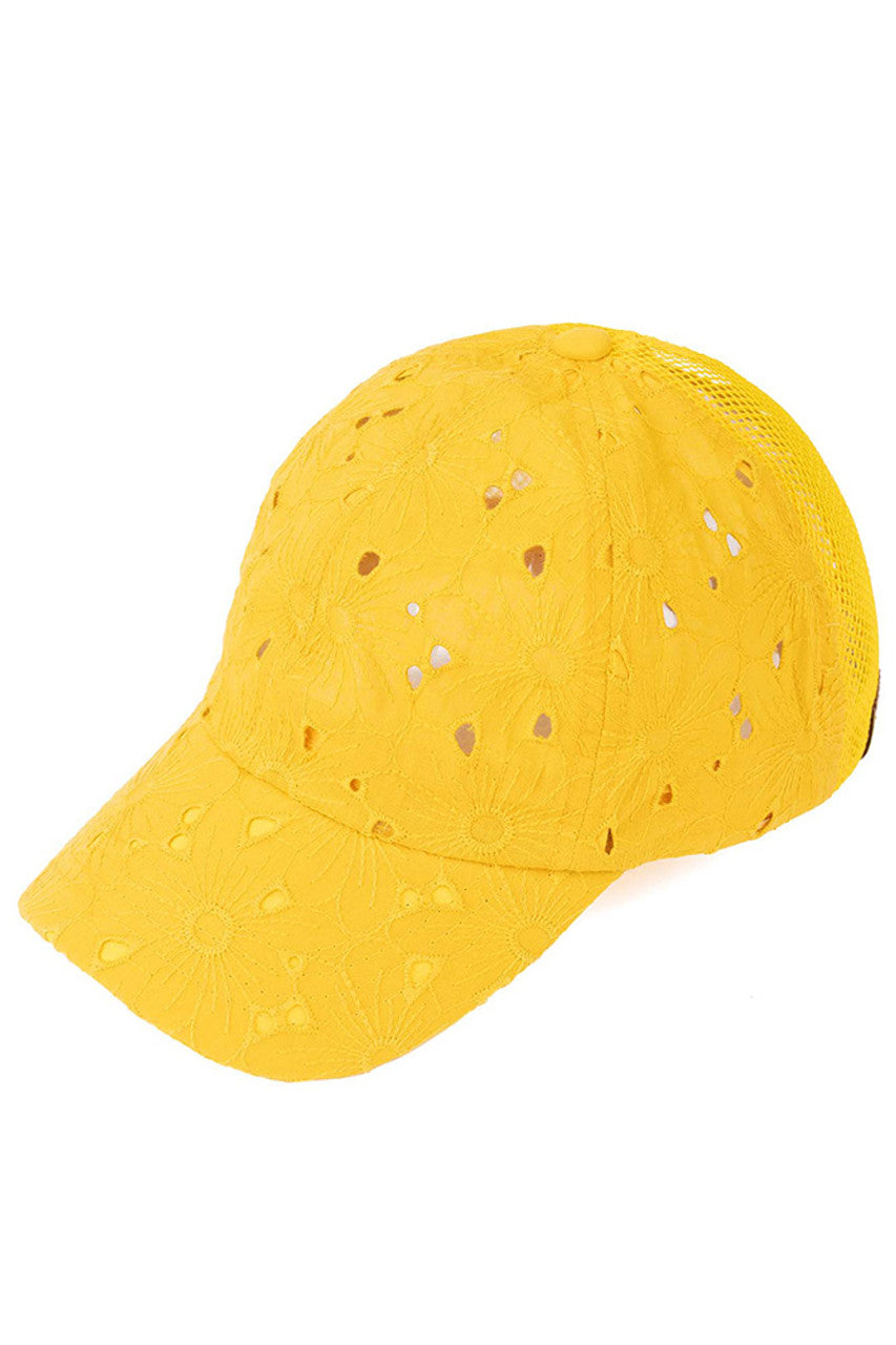 Mustard C.C EMBROIDERED FLORAL COTTON PONY CAP is made from high-quality cotton and features beautifully embroidered floral designs. It offers both style and functionality, protecting from the sun while adding a touch of elegance to your outfit. Perfect for all seasons.