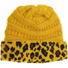 Mustard Matching Cuff Leopard Print CC Beanie combines expert craftsmanship with standout style. Designed with a comfortable cuff and eye-catching leopard pattern, this beanie offers reliable warmth and a fashionable look. Its stretchy fabric ensures a secure fit for extended wear, making it an ideal accessory for cool weather while enhancing your seasonal wardrobe with a touch of wild sophistication. 