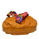 Mustard Vegan Leather Guitar Strap Fashionable Women's Crossbody Bag, is perfect to carry all your handy items with ease. This vegan leather crossbody bag features a top zipper closure for security that makes your life easier and trendier. Its catchy and awesome appurtenance drags everyone's attraction to you. Great for different activities including quick getaways, attending parties, picnics, beach, etc! It's very easy to carry with your hands.
