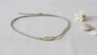 Cord Necklace with a Gold and Crystal Charm - Charming Charlie
