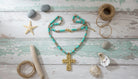 Beaded Cross with Gold Accent Necklace - Charming Charlie