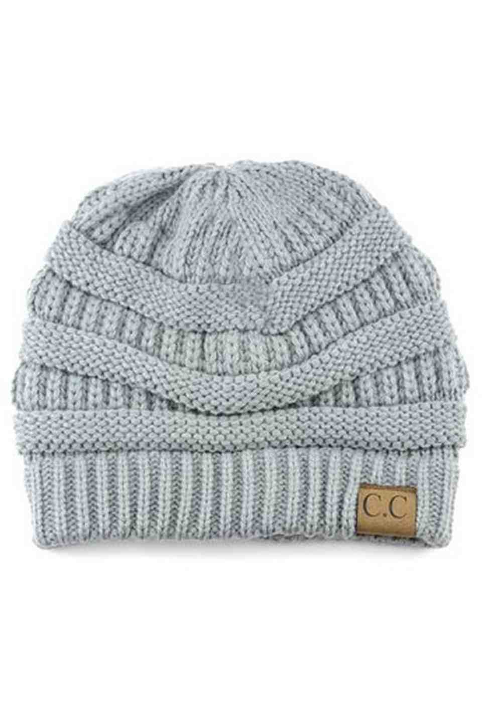 NaturalGrey  C.C Ribbed Knit Solid Color Beanie offers a timeless design with durable ribbed knitting, ensuring a snug and comfortable fit. Crafted for warmth and versatility, this beanie is perfect for everyday wear, providing reliable protection against cold weather while maintaining a sleek, minimalist style that complements any outfit. Its solid color adds understated appeal, making it an essential accessory for both casual and outdoor use. 