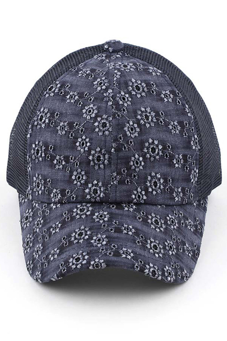 Navy C.C FLOWER EMBROIDERY EYELET CRISS CROSS PONYCAP features delicate flower embroidery and eyelet detailing, with a criss cross design for a chic and stylish look. Made with quality materials, this cap offers both fashion and functionality. Perfect for any casual or outdoor activity, it will keep you cool and covered.