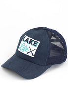Navy C.C LAKE LIFE PATCH CRISS CROSS PONY CAP is the perfect accessory for those who love spending time at the lake. The crisscross pony cap design adds a stylish touch, while the lakelife patch showcases your love for the great outdoors. Made with high-quality materials, this cap provides both comfort and durability.
