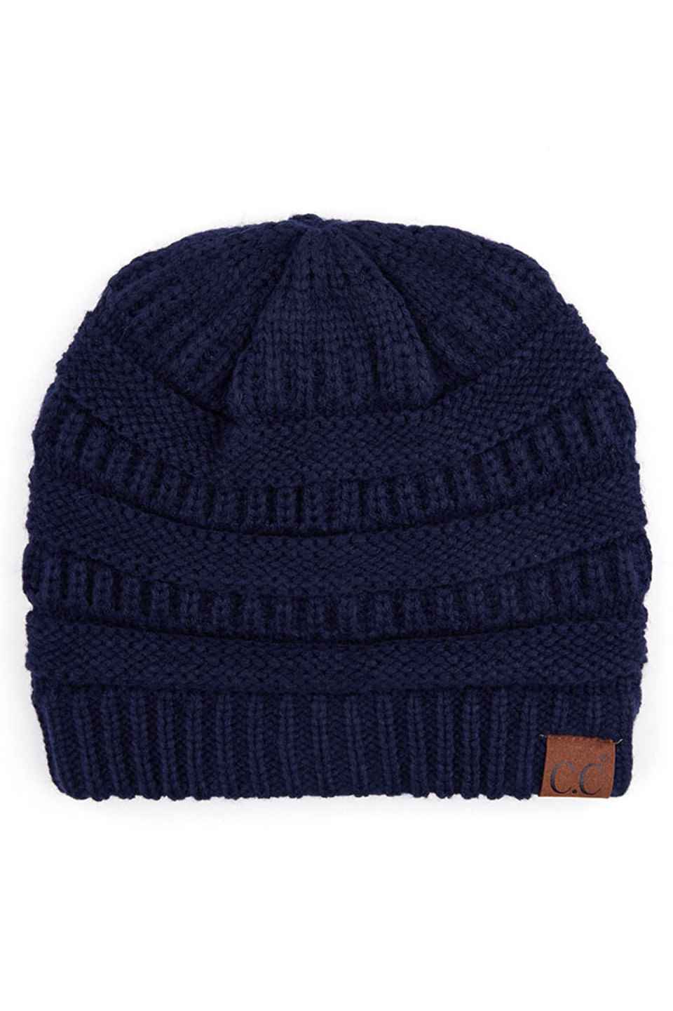 Navy  C.C Ribbed Knit Solid Color Beanie offers a timeless design with durable ribbed knitting, ensuring a snug and comfortable fit. Crafted for warmth and versatility, this beanie is perfect for everyday wear, providing reliable protection against cold weather while maintaining a sleek, minimalist style that complements any outfit. Its solid color adds understated appeal, making it an essential accessory for both casual and outdoor use. 