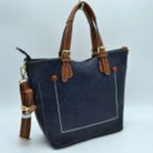 Navy blue Vegan&nbsp;Leather Tote Shoulder Handbags For Women. Ideal for everyday occasions such as work, school, shopping, etc. Made of high quality&nbsp;Vegan&nbsp; leather material that's light weight and comfortable to carry. Spacious main compartment with magnetic snap closure to safely store a variety of personal items such as wallet, tablet, phone, books, and other essentials. One interior open pocket for small accessories within hand's reach.