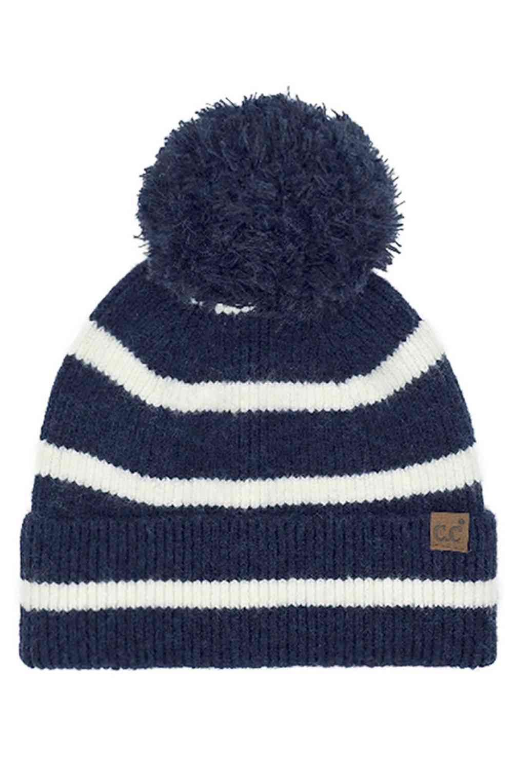 Navy Wrap yourself in cozy chic with the C.C Two Tone Stripe Yarn Pom Beanie. Its vibrant stripes and playful pom-pom effortlessly elevate any winter outfit. Crafted for both warmth and style, this beanie is the perfect accessory for your daily adventures or a thoughtful gift for a fashion-forward friend. Embrace the season in style – get yours today!