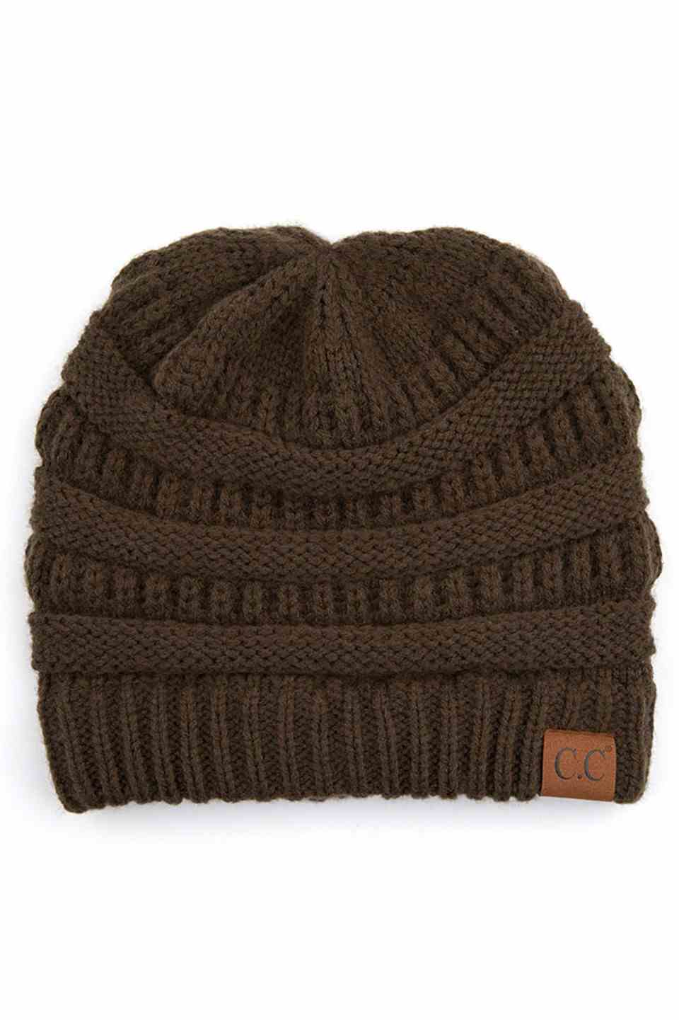 NewOlive  C.C Ribbed Knit Solid Color Beanie offers a timeless design with durable ribbed knitting, ensuring a snug and comfortable fit. Crafted for warmth and versatility, this beanie is perfect for everyday wear, providing reliable protection against cold weather while maintaining a sleek, minimalist style that complements any outfit. Its solid color adds understated appeal, making it an essential accessory for both casual and outdoor use. 
