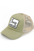Olive  C.C CHAOS COORDINATOR PATCH PONY CAP is the perfect accessory for any outfit. Made with high-quality materials, it features a stylish patch design and a comfortable ponycap fit. Stay organized and stylish with this practical and on-trend cap.
