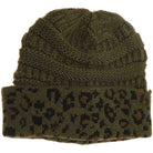 Olive Matching Cuff Leopard Print CC Beanie combines expert craftsmanship with standout style. Designed with a comfortable cuff and eye-catching leopard pattern, this beanie offers reliable warmth and a fashionable look. Its stretchy fabric ensures a secure fit for extended wear, making it an ideal accessory for cool weather while enhancing your seasonal wardrobe with a touch of wild sophistication. 