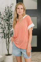 One Piece at a Time V-Neck Short Sleeve Top in Coral - Charming Charlie
