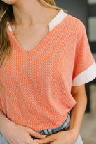 One Piece at a Time V-Neck Short Sleeve Top in Coral - Charming Charlie