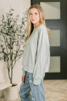 Petal Poise Floral Applique Pullover in Ivy - Charming Charlie