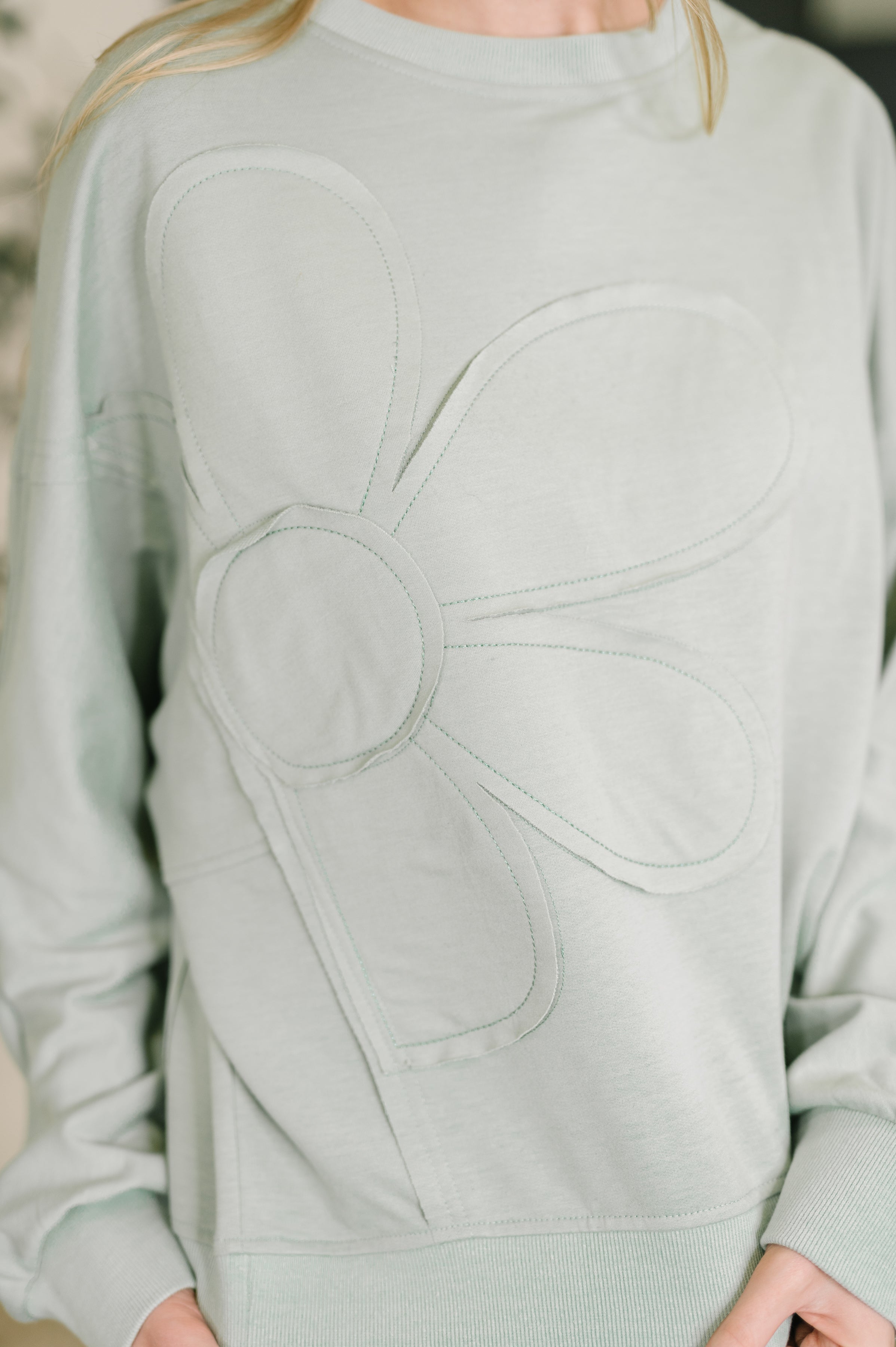 Petal Poise Floral Applique Pullover in Ivy - Charming Charlie